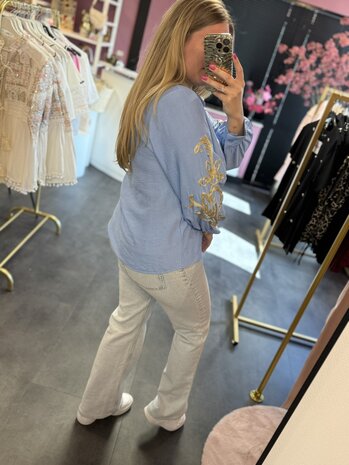 Blouse blauw met goud 
