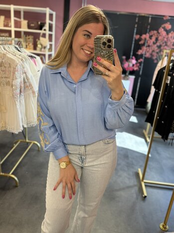 Blouse blauw met goud 